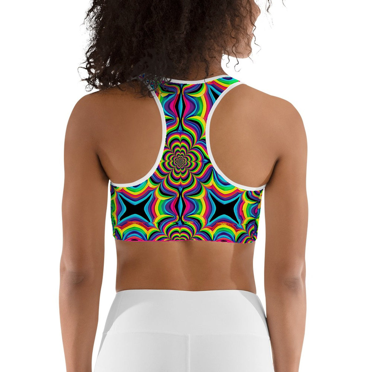 Custom all over print sports bra with a rainbow optical illusion pattern, back view